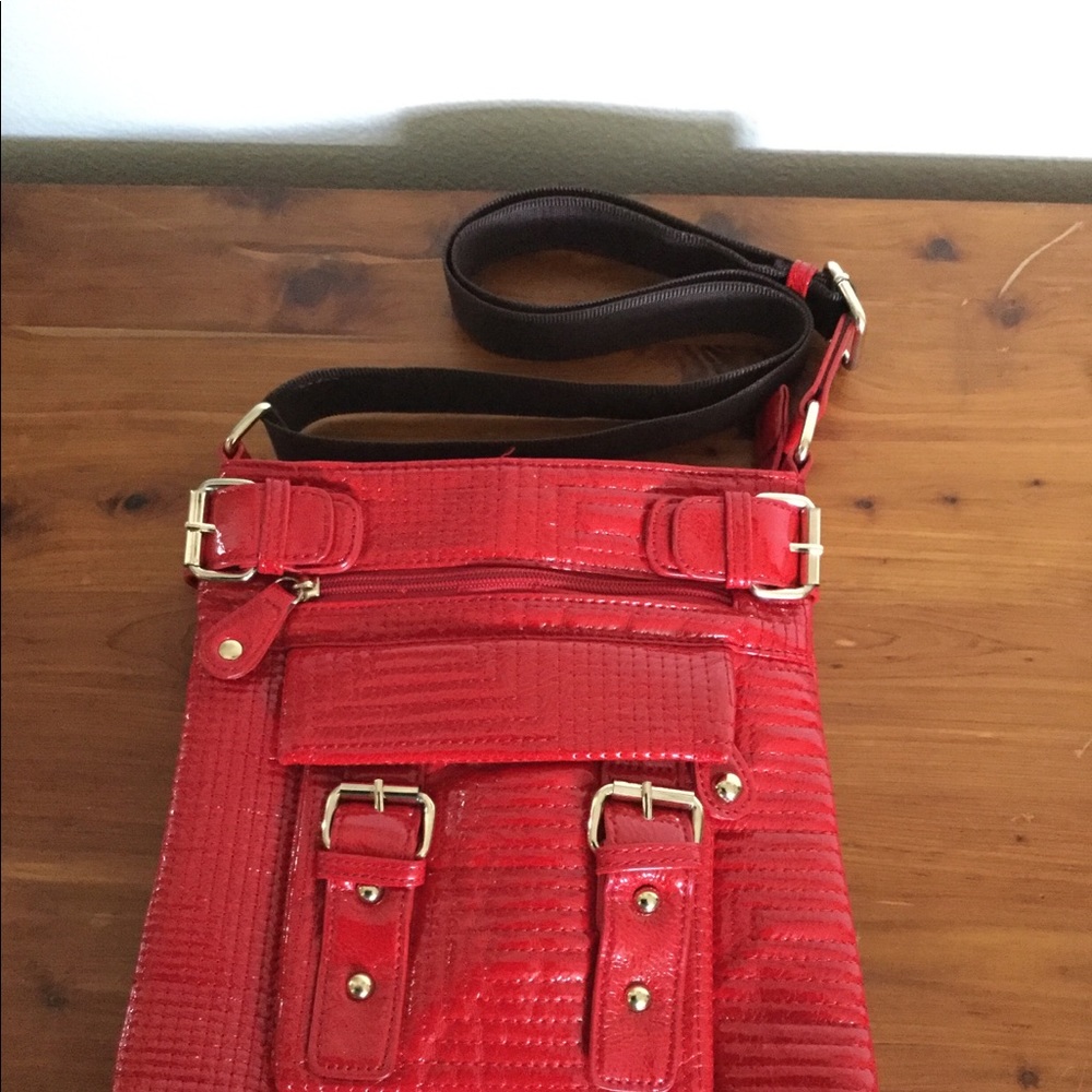 Red crossbody bag with a lot of pockets